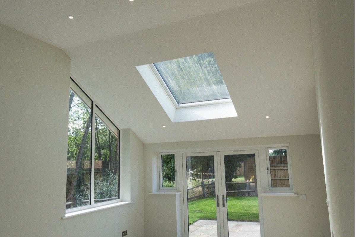A bright, newly wired extension with downlights and a roof window — work by Allview Electrical