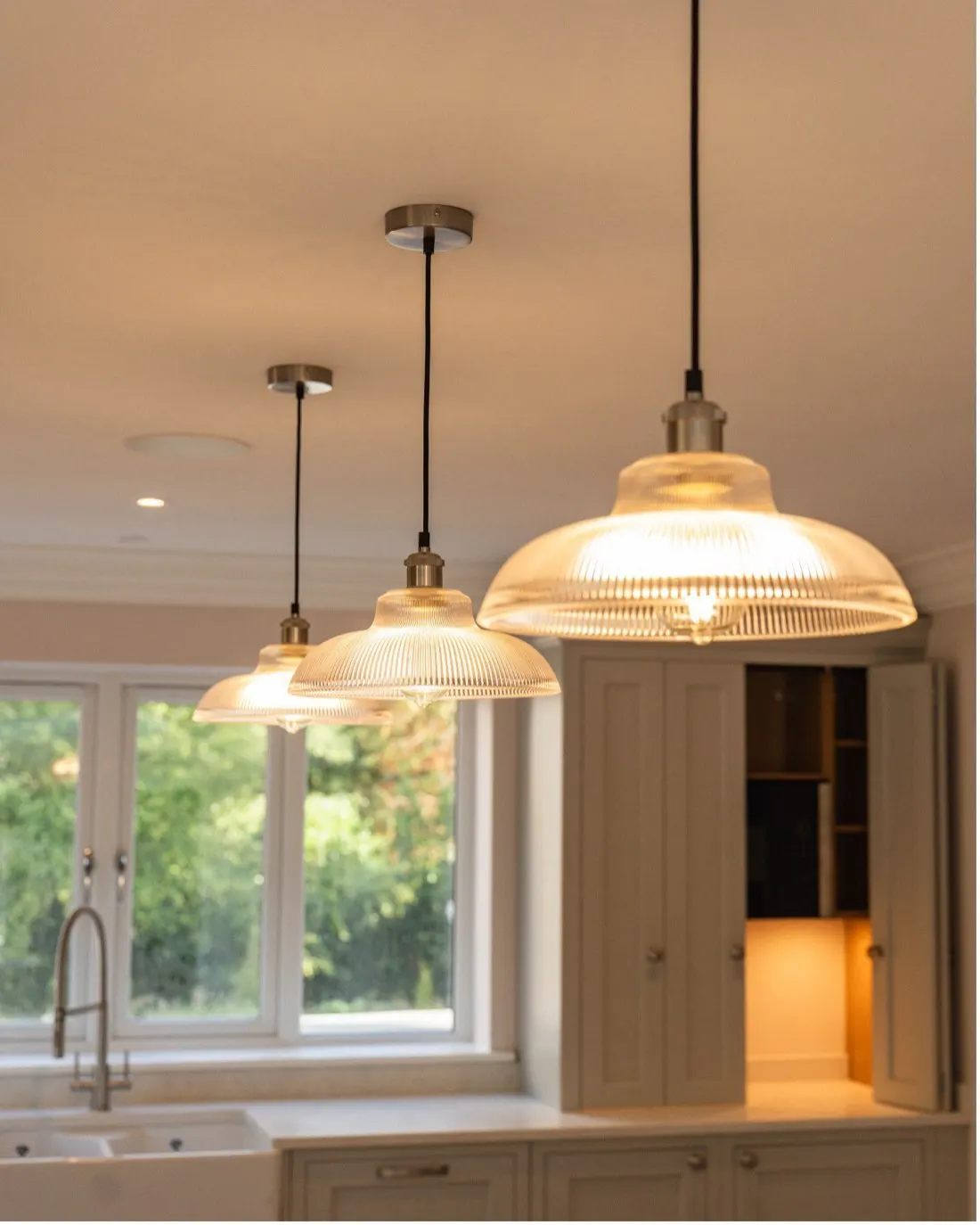 Pendant and under-cabinet lighting in a kitchen finished by Allview Electrical